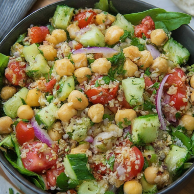 a photo of a cucumber chickpea salad