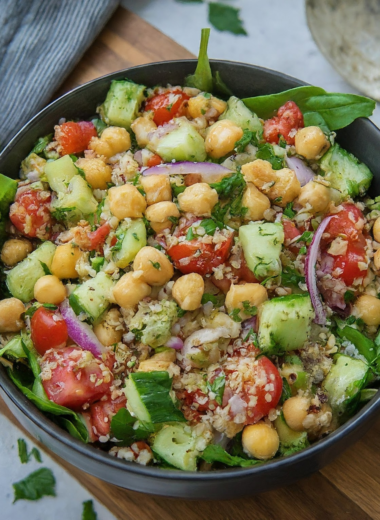 a photo of a cucumber chickpea salad